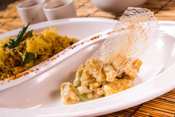 stir fried prawn with black pepper wasabi sauce and oat butter sauce chinese  halal menu on bamboo background