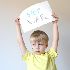 A child with the flag of Ukraine