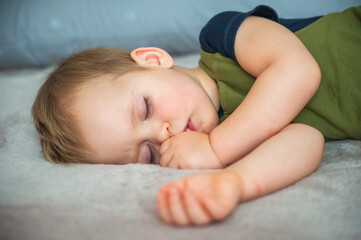 Toddler boy sleeping close-up. bedtime