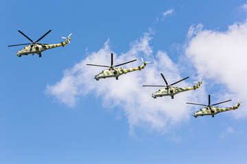 russian attack military helicopters is flying in the sky