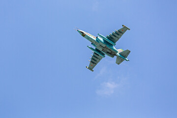 russian military fighter-bomber aircraft in the sky. closeup view.