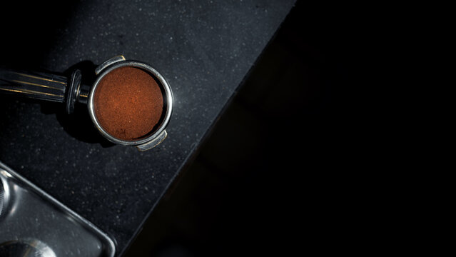 coffee tamper on coffee machine