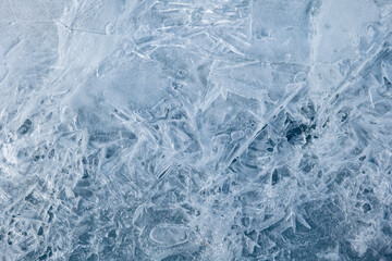Texture of winter ice surface. Blue natural ice background.