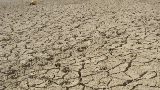 Dry land by drought in a place where before there was a lake