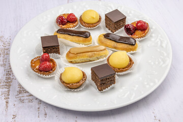 sweet petit four in a white plate