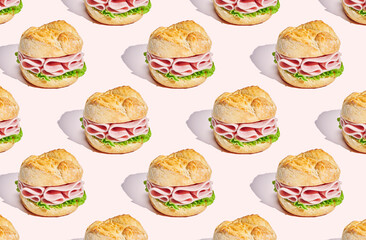 Pattern of sandwich on coral pastel background