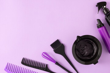 Hair care, styling and coloring products with hair dye tools flat lay. Copy space