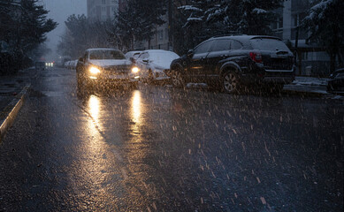 Obraz na płótnie Canvas car light in blizzard, front view