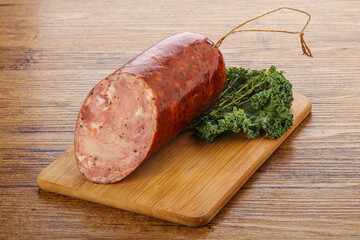 Pork ham sausage over board