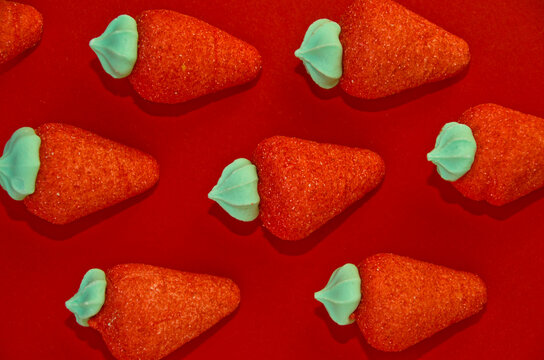 Red Marshmallow Strawberries On A Red Background