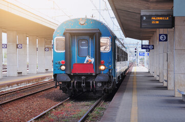Train to Palermo arrives at sunset. Milazzo.