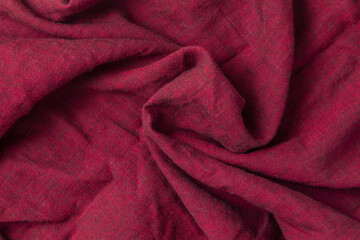 Crumpled red cloth. Background of red fabric.