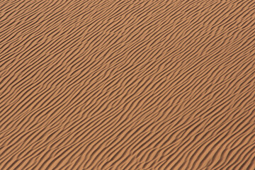 Fototapeta premium close up of wave pattern in sand dune