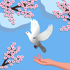 A hand releasing bird to freedom in spring time