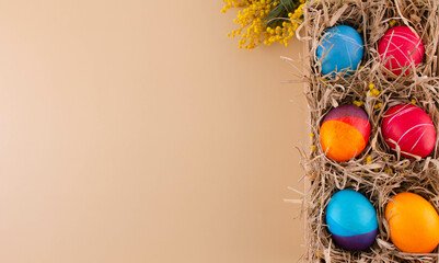 Easter eggs. Festive decoration. Easter. Celebration. Bright holiday. Eggs on a beige background. Multi-colored eggs on a beige background.