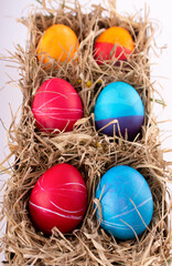 Fototapeta na wymiar Easter eggs. Festive decoration. Easter. Celebration. Bright holiday. Eggs on a white background. Multi-colored eggs on a white background.