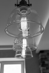 black and white pendant lamp with edison bulb