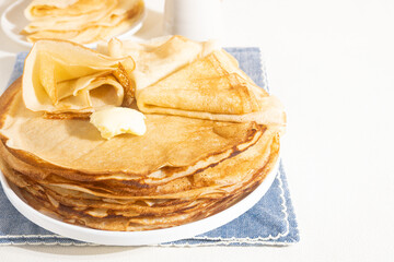 Yeast pancakes on a white plate