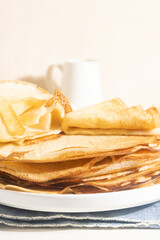 Yeast pancakes on a white plate