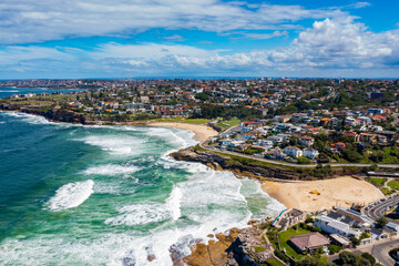 Aerial drone view of iconic Bronte Beach and Tamarama Beach coastline in Sydney, Australia during summer on a sunny day   - obrazy, fototapety, plakaty