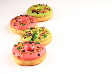 Assorted Pink and Green Doughnut with Colorful Sprinkle Isolated on White Background, Copy Space for Text