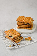 a stack of shortbread cookies with raisins