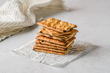 a stack of shortbread cookies with raisins