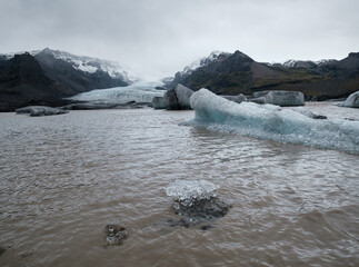 Glacier tongue slides from the Vatnajokull icecap or Vatna Glacier near subglacial Oraefajokull...