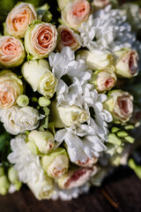 Bouquet of fresh bright flowers. Holiday decor. Accessories for the bride on the wedding day