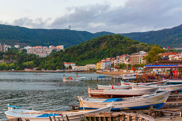 Fototapeta na wymiar amasra/turkey. 12september 2020 view of a beautiful resort town and boats on the sea coast. 