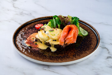 Toast with salmon, poached egg and avocado Poached egg with salmon