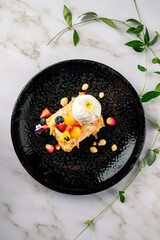 puff pastry cake with ice cream and fresh berries