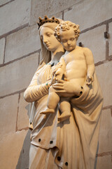 PARIS, FRANCE - JUNE 16, 2011: The marble statue of Madonna in the Saint Denis cathedral.