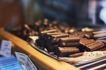 Something sweet to make your day. Cropped shot of chocolate treats in a bakery.