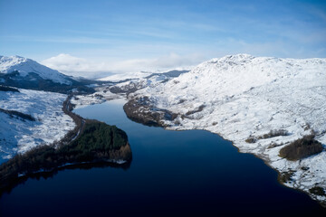 Fototapeta na wymiar Loch Dochart aerial view showing fallen snow during winter