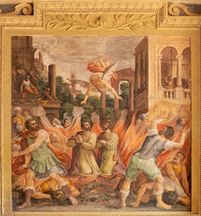 ROME, ITALY - AUGUST 30, 2021: The fresco of martyrdom of St. Cosmas and Damian in the church...