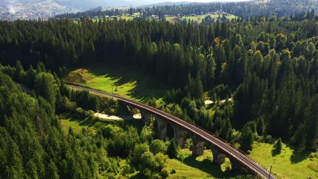 Drone flight over an ancient Austrian viaduct on a summer day. Filmed in UHD 4k video.