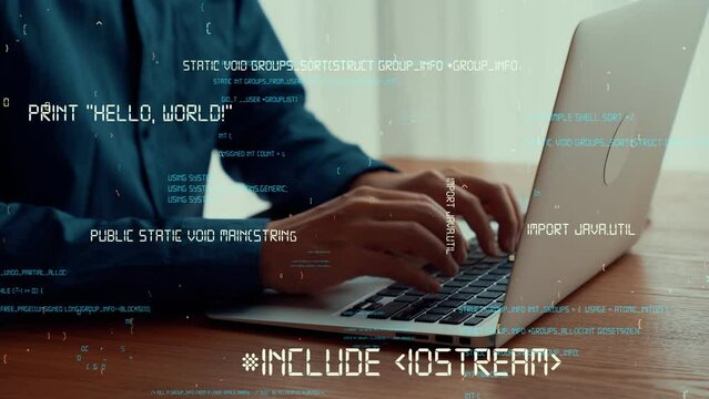 Computer programmer uses capable laptop computer to develop programming code of new software . Computer specialist working on future coding application for software programming development .