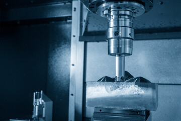 The CNC milling machine rough cutting the injection mold insert part by indexable  tools.