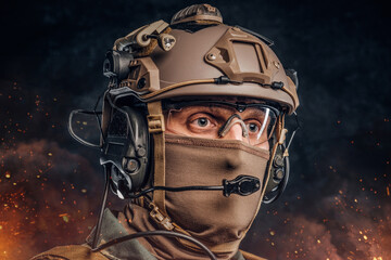 Headshot of professional soldier dressed in protective uniform