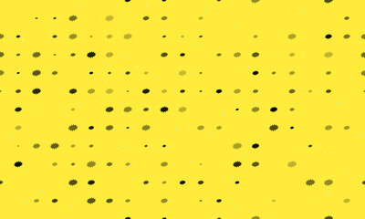 Seamless background pattern of evenly spaced black explosion symbols of different sizes and opacity. Vector illustration on yellow background with stars