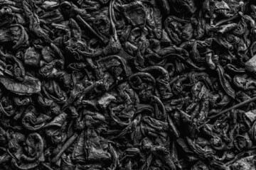 Texture of tea. Dry black tea leaves. 