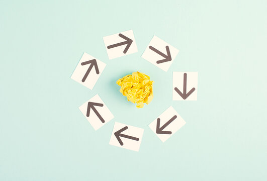 Teamwork, brainstoming for new ideas, solving a probem, strategy for a target, working together, arrow pointing to a goal
