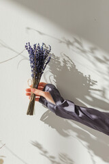 dried lavender bouquet with hands