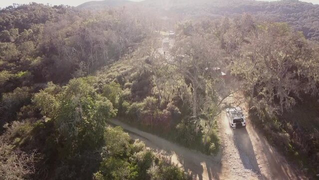 Group of 4x4 training on off road course track, aerial drone view