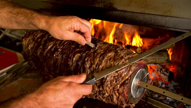4K Resolution. Cağ kebab is a kind of kebab in Turkish cuisine, which is made from goat meat or lamb.