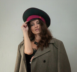 face of soviet woman in military cap and jacket
