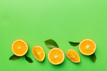 fresh Fruit orange slices on colored background. Top view. Copy Space. creative summer concept. Half of citrus in minimal flat lay with copy space