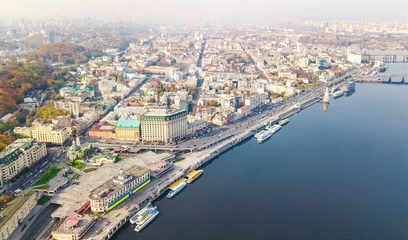 Foto op Plexiglas Kyiv cityscape aerial drone view, Dnipro river, downtown and Podol historical district skyline from above, city of Kiev and Dnieper, Ukraine © Iuliia Sokolovska
