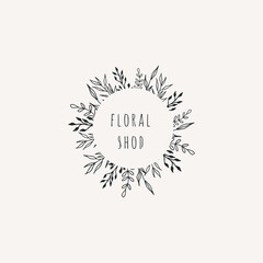 Hand drawn botanical floral logo template. Line art style. Feminine floral monogram 